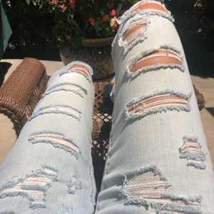 Ripped light blue jeans sizes 4 & 6